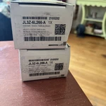 Genuine Ford Tensioner JL3Z-6L266-C New. Price: $75.00.