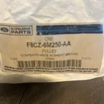 Ford F8CZ-6M250-AA Pulley And Adjustment Arm Idler 1998-1999 New. Price: $110.50.
